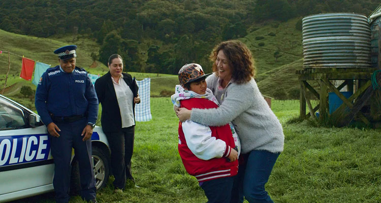 Hunt For The Wilderpeople 2016 Movie Rima Te Wiata hugging Julian Dennison