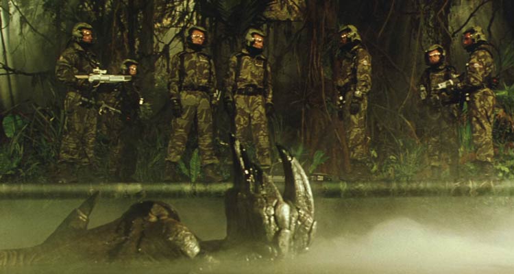 A Sound of Thunder 2005 Movie Scene Time Travelers looking at the dead dinosaurs they've just killed