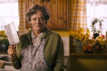 Keeping Mum 2005 Movie Scene Maggie Smith as Grace holding a meat cleaver