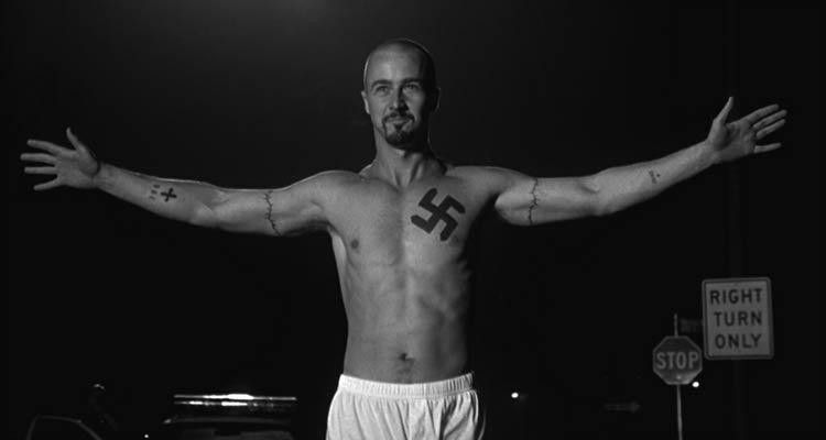 American History X 1998 Movie Scene Edward Norton as Derek in white underwear and a swastika tattoo on his chest after he killed black robbers