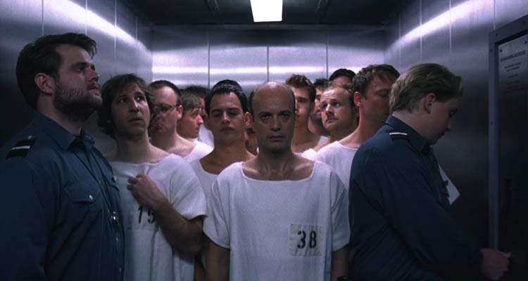 Das Experiment 2001 Movie Scene Patients riding in an elevator wearing white gowns