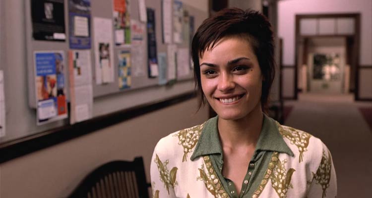 The Rules of Attraction 2002 Movie Scene Shannyn Sossamon as Lauren biting her lip and looking seductively into the camera