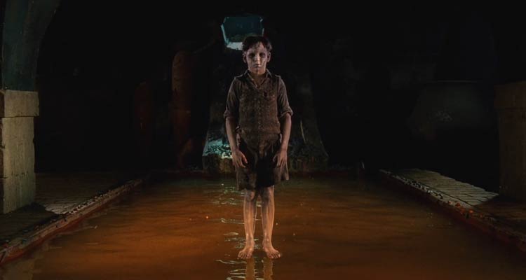 The Devils Backbone 2001 Movie Scene A ghost of a young boy hovering above the pool in the basement of the orphanage