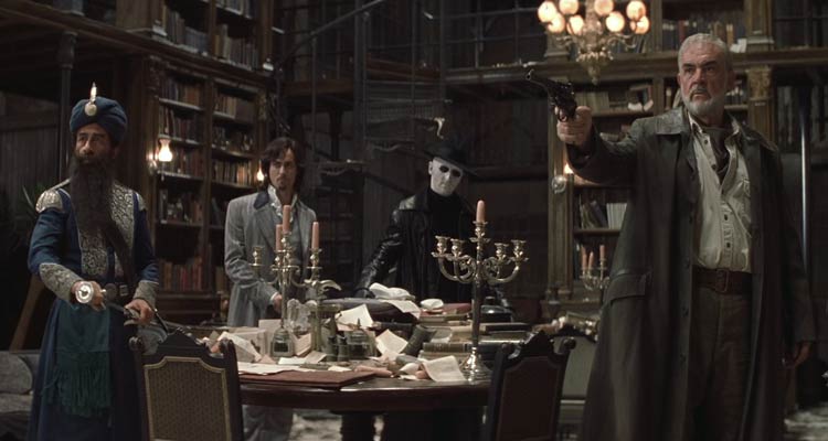 The League of Extraordinary Gentlemen 2003 Movie Scene Sean Connery as Allan Quatermain holding a gun with Naseeruddin Shah as Captain Nemo, Stuart Townsend as Dorian Gray and Tony Curran as Rodney in the background