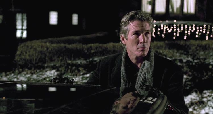 The Mothman Prophecies 2002 Movie Scene Richard Gere as John Klein standing outside his car in Point Pleasant after he has seen some strange event
