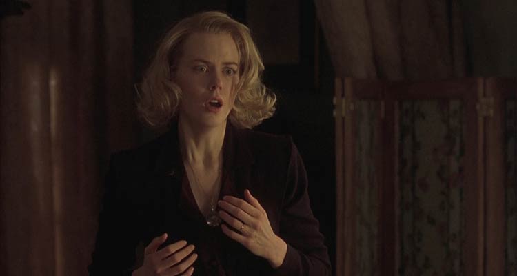 The Others 2001 Movie Scene Nicole Kidman as Grace seeing ghosts in her mansion