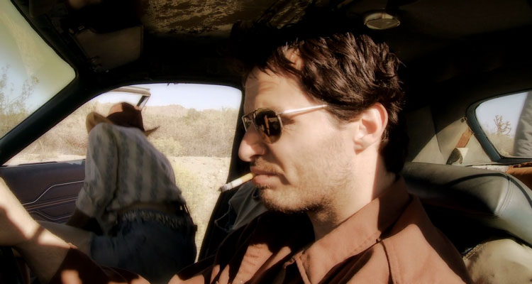 Drifter: Henry Lee Lucas 2009 Movie Scene Antonio Sabato Jr. as Henry driving a car with Kostas Sommer as Ottis getting out