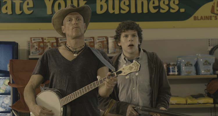 Zombieland 2009 Movie Scene Jesse Eisenberg as Columbus and Woody Harrelson as Tallahassee playing the banjo to draw out zombies in a supermarket