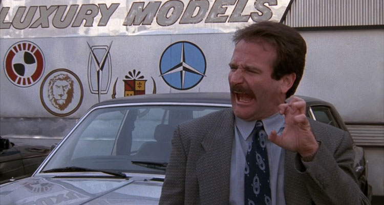 Cadillac Man Movie 1990 Scene Robin Williams as Joey in front of the car dealership