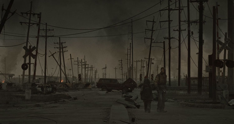 The Road Movie 2009 Scene A father and son walking down a rundown road in a post-apocalyptic world