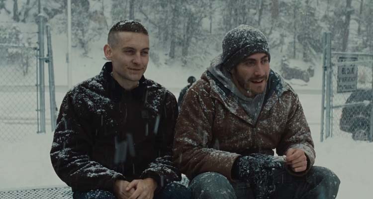 Brothers 2009 Movie Scene Jake Gyllenhaal as Tommy and Tobey Maguire as Sam sitting on a bench and talking