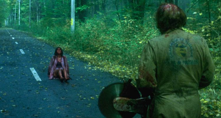 High Tension 2003 Movie Scene The killer holding a circular saw and walking towards Maïwenn as Alex