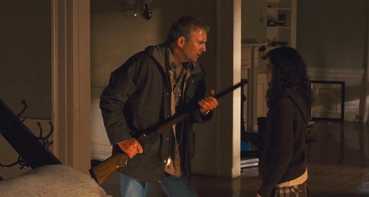 The New Daughter 2009 Movie Scene Kevin Costner as John James holding a shotgun in front of his daughter Ivana Baquero as Louisa