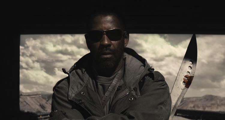 The Book of Eli 2010 Movie Scene Denzel Washington as Eli holding a big bloody knife under the bridge