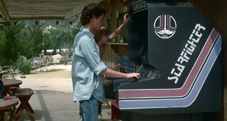 The Last Starfighter 1984 Movie Scene Lance Guest as Alex Rogan playing Starfighter video game in his trailer park
