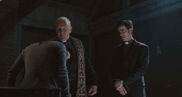 The Rite 2011 Movie Scene Anthony Hopkins as Father Lucas Trevant and Colin O'Donoghue as Michael Kovak performing an exorcism
