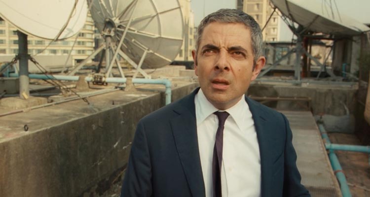 Johnny English Reborn 2011 Movie Scene Rowan Atkinson as Johnny English on top of a building