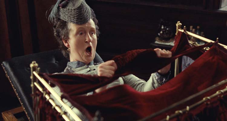 Hysteria 2011 Movie Scene A woman enjoying a pelvic massage she's receiving from a doctor