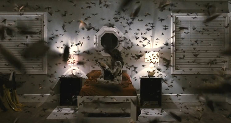 The Possession 2012 Movie Scene A swarm of moths flying all around Natasha Calis as Em and the wooden Dybbuk box