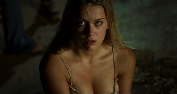 All the Boys Love Mandy Lane 2006 Movie Amber Heard looking at the roof with her cleavage showing