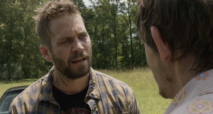 Pawn Shop Chronicles 2013 Movie Scene Paul Walker as Raw Dog arguing with someone