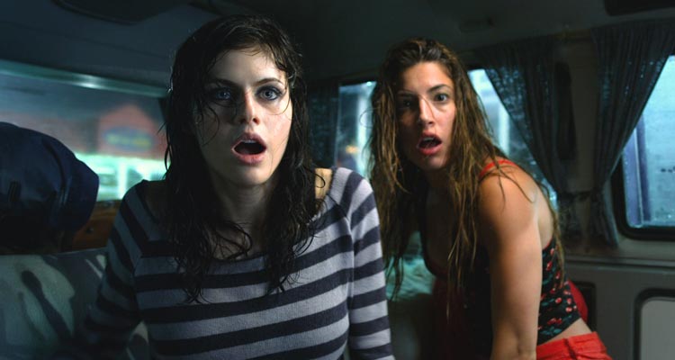 Texas Chainsaw 3D 2013 Movie Scene Alexandra Daddario as Heather and Tania Raymonde as Nikki surprised in the van