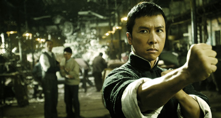 Yip Man 2008 Movie Donnie Yen as IP Man working in a factory but getting ready for a fight with Japanese occupying forces scene