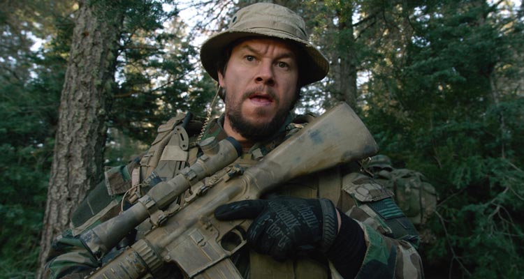 Lone Survivor 2013 Movie Scene Mark Wahlberg as Marcus Luttrell holding a gun about to go into the fight