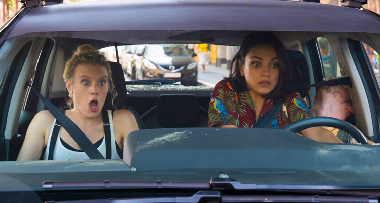 The Spy Who Dumped Me 2018 Mila Kunis as Audrey and Kate McKinnon as Morgan driving a car in a car chase