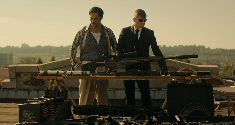 Lucky Day 2019 Movie Scene Crispin Glover as Luc and Tomer Sisley as Jean-Jacques looking at weapons at the roof of the bar