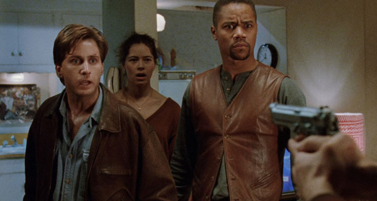 Judgment Night 1993 Movie Scene Emilio Estevez as Frank and Cuba Gooding Jr. as Mike with Angela Alvarado as Rita behind in her apartment