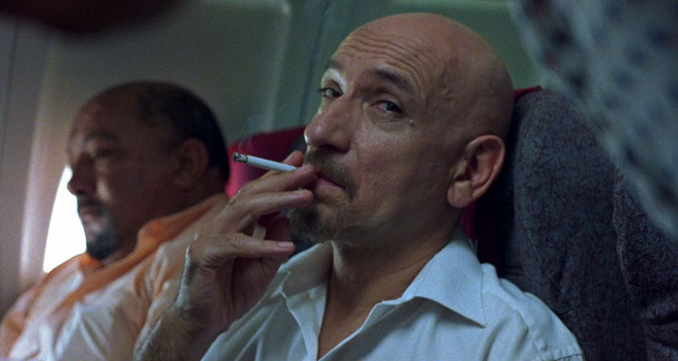 Sexy Beast Movie 2000 Scene Ben Kingsley as Don Logan smoking a cigarette aboard a plane