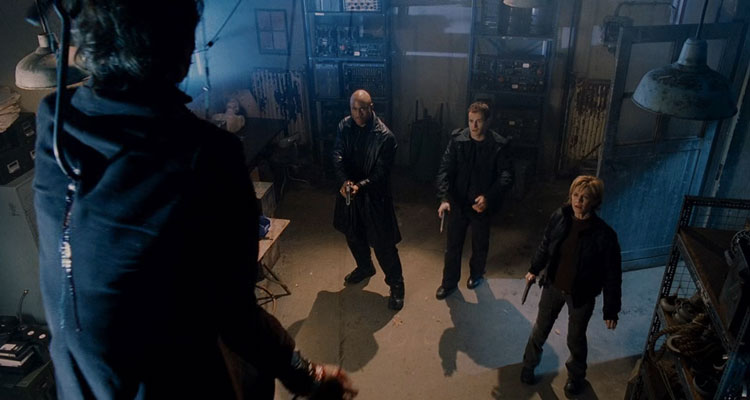 Mindhunters Movie 2004 Scene FBI profilers entering a room on an island only to find a dead body hanging from a celling