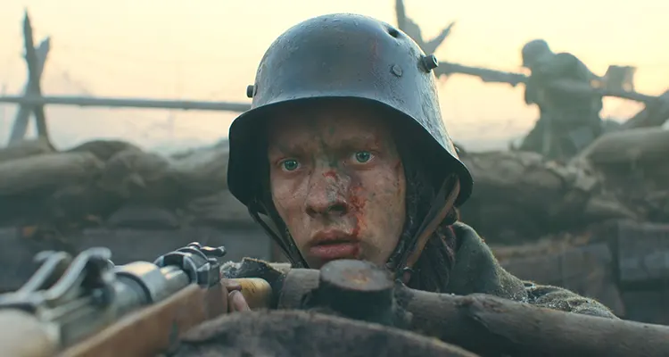All Quiet on the Western Front 2022 Movie Scene Felix Kammerer as Paul in the trench holding a Gewehr 98 rifle