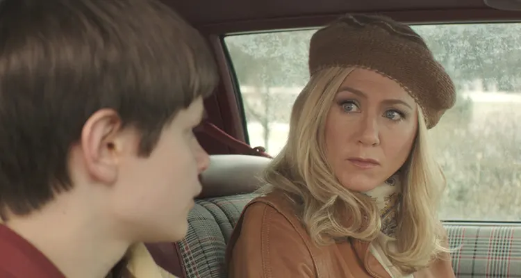 Life of Crime 2013 Movie Scene Jennifer Aniston as Mickey Dawson in a car wearing a beret