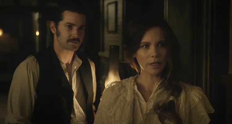 Stonehearst Asylum 2014 Movie Scene Kate Beckinsale as Eliza Graves and Jim Sturgess as Edward Newgate wandering the halls of the asylum
