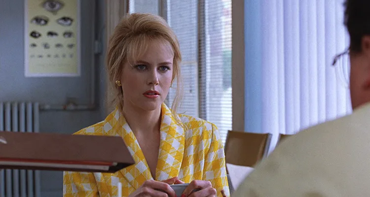 To Die For 1995 Movie Scene Nicole Kidman as Suzanne Stone in a bright yellow dress convincing her future boss to get her a job
