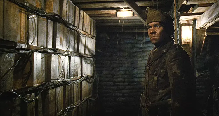 Beneath Hill 60 2010 Movie Scene Brendan Cowell as Oliver Woodward looking at the explosives in the tunnel