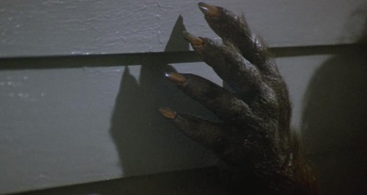 Silver Bullet 1985 Movie Scene A werewolf paw on the wall of a house