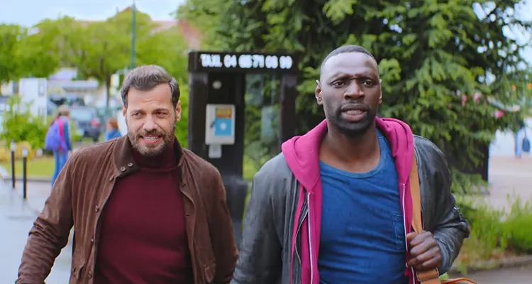 The Takedown 2022 Movie Scene Omar Sy as Ousmane Diakhité and Laurent Lafitte as François Monge