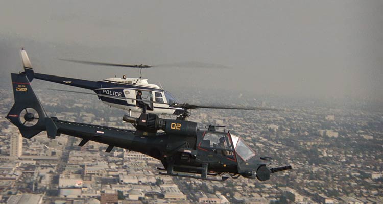 Blue Thunder 1983 Movie Scene Murphy driving an experimental helicopter Blue Thunder with the police helicopter chasing it