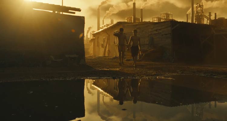 Mondocane 2021 Movie Scene Dennis Protopapa as Mondocane and Giuliano Soprano as Pisciasotto walking home through a decrepit neighborhood