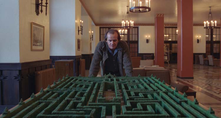 The Shining 1980 Movie Scene Jack Nicholson as Jack Torrance looking at the maze in the lobby of the Overlook Hotel