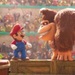 The Super Mario Bros Movie 2023 Scene Mario standing on a crate next to Donkey Kong