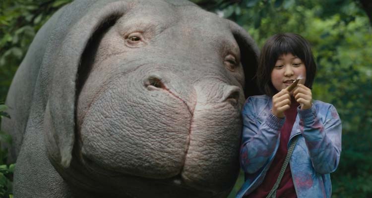 Okja 2017 Movie Scene Seo-hyun Ahn as Mija and her giant pig