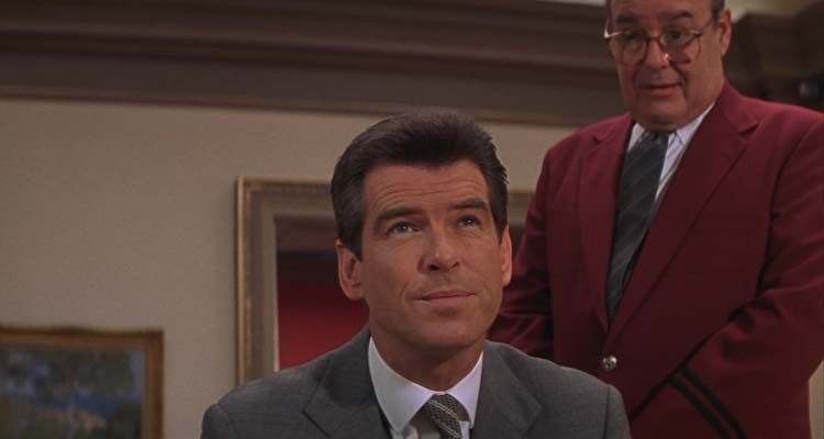 The Thomas Crown Affair 1999 Movie Scene Pierce Brosnan as Thomas Crown in the Metropolitan Museum of Art looking at his favorite paining he's about to steal