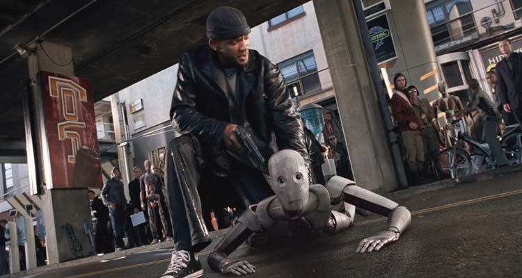 I Robot 2004 Movie Scene Will Smith as Del Spooner holding a gun pointed at a robot