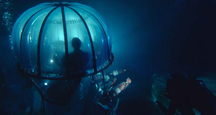 Sanctum 2011 Movie Scene Divers in the underwater cave system using a bell to make a pit stop before reaching their forward camp