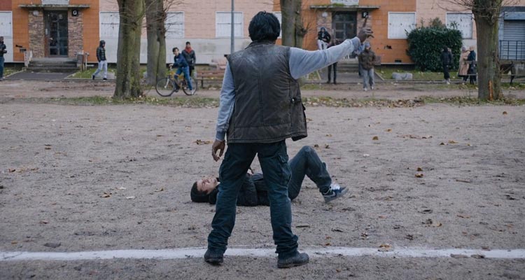 Dheepan 2015 Movie Scene Jesuthasan Antonythasan as Dheepan drawing a line in his hood to tell the criminals to stay away