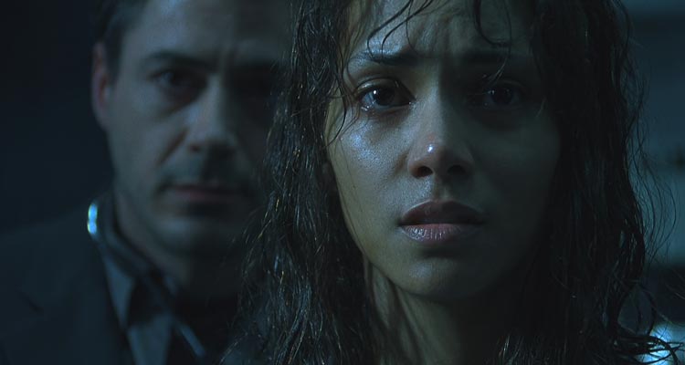 Gothika 2003 Movie Scene Halle Berry as Miranda Grey looking in the mirror at Robert Downey Jr. as Pete Graham standing behind her